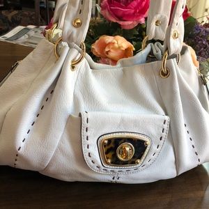 Makowsky gorgeous white trimmed soft leather with brown handles